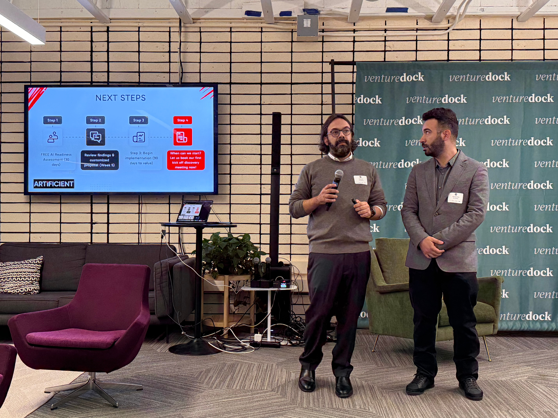Speakers presenting next steps during a custom innovation program event