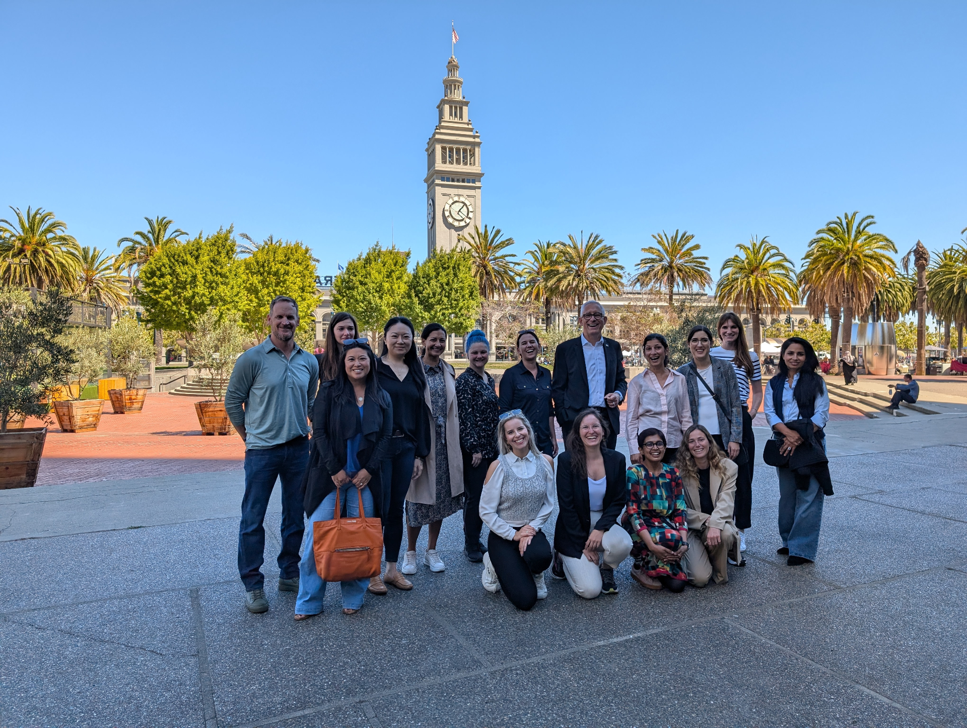 Founders and mentors gathered outdoors in San Francisco during a GUILD program